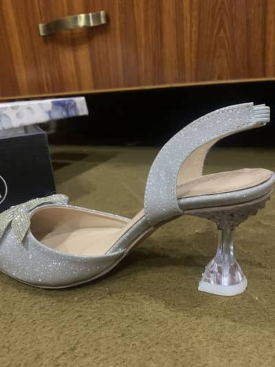 Silver heels one time used
