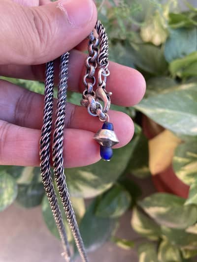 Vintage chain necklace with a unique pendant.