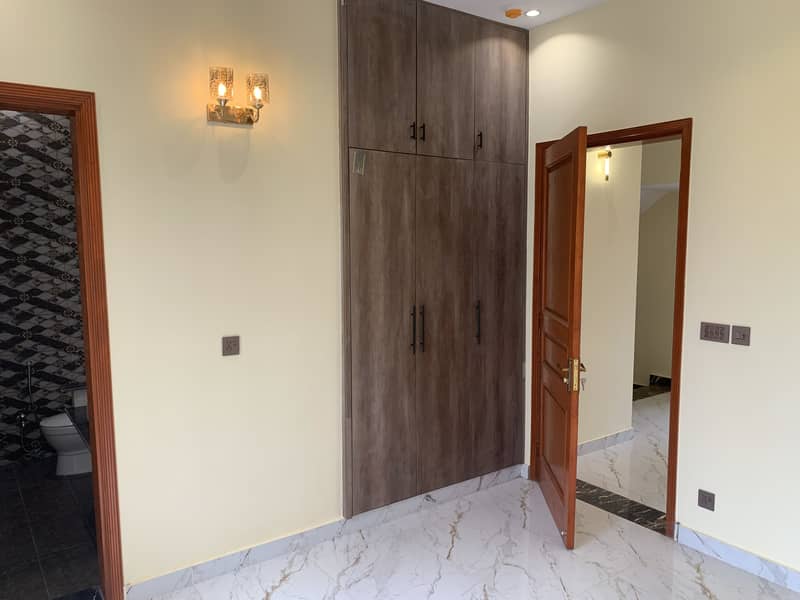 5 MARLA BRAND NEW TOP NOTCH LOCATION HOUSE IS FOR SALE IN DHA PHASE 11 RAHBAR BLOCK "P" 11