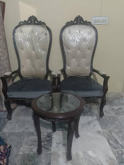 two crown chair  with  a side table
