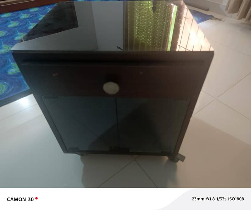 Queen bed with side table. 7