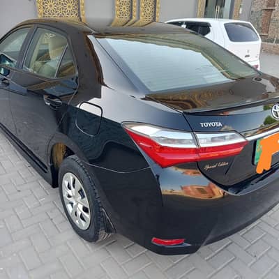 Toyota Corolla gli special edition. batter than city Cultus