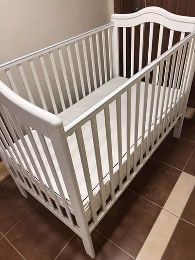 Giggles brand baby cot with mattress imported