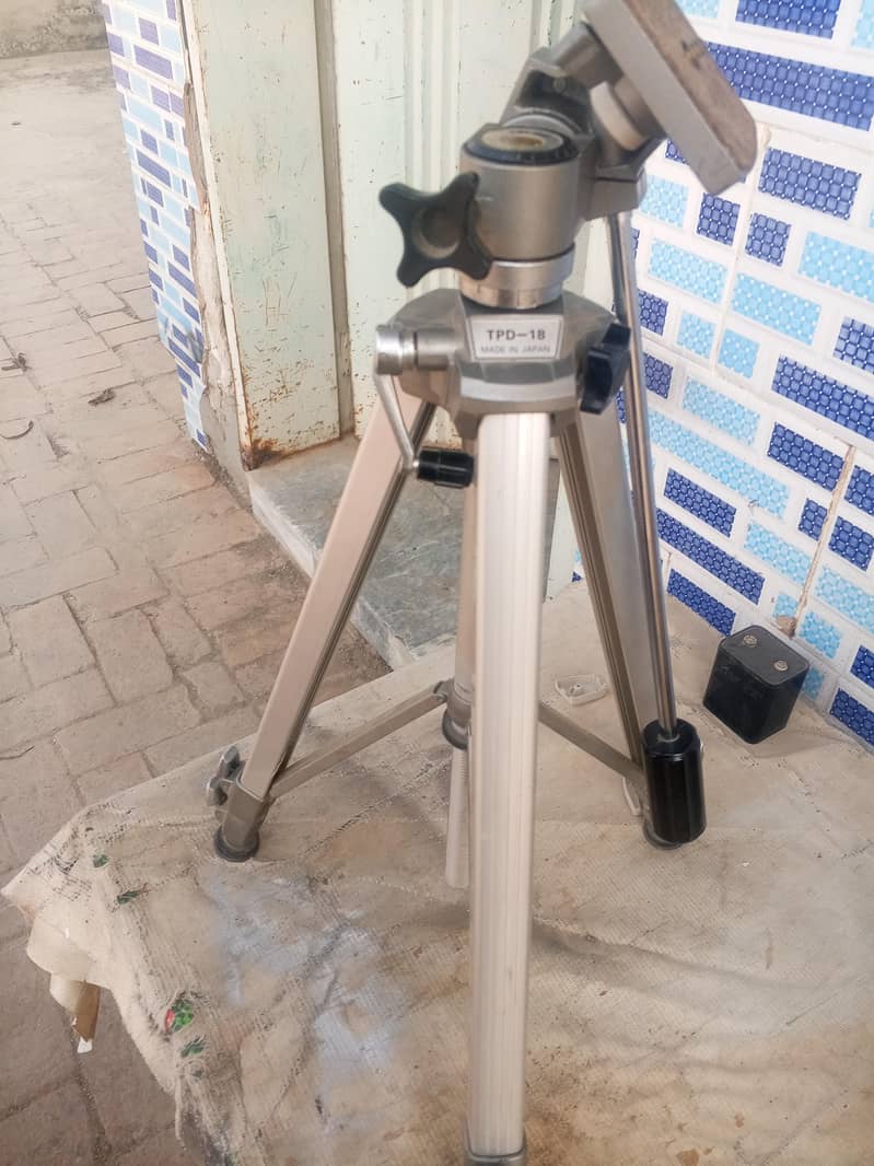 Tripod with Olympus camera 0