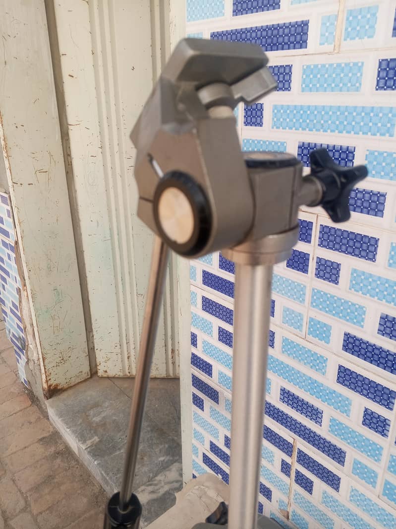 Tripod with Olympus camera 16