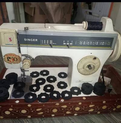 singar embroidery and  sewing machine