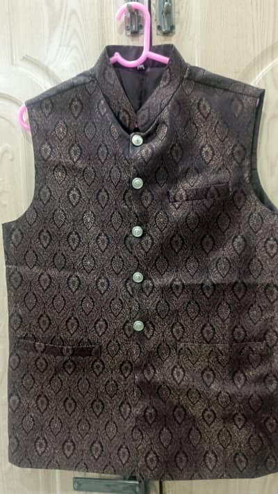 new wase coat medium size not used yet