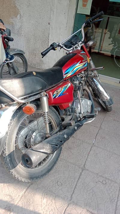 honda 125 for sale good condition lahore number hai meray apnay nam pr