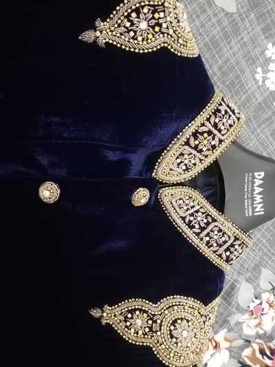 Damini velvet Blue sherwani with heavy work