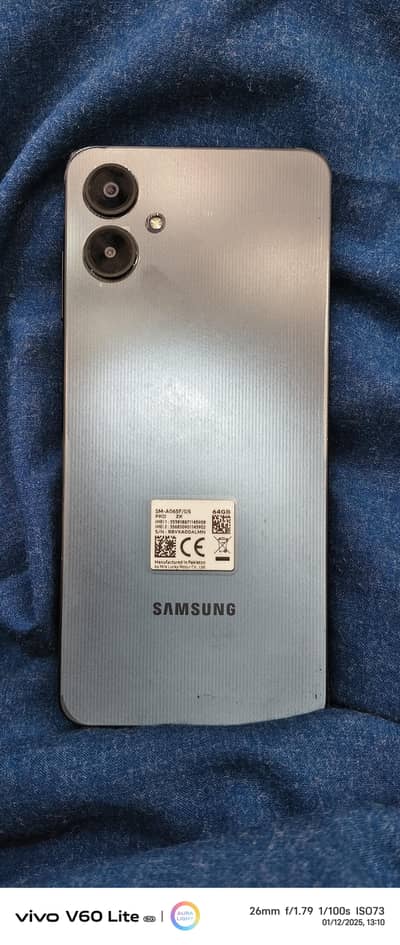 Samsung A06 only 2 month use with box and charger
