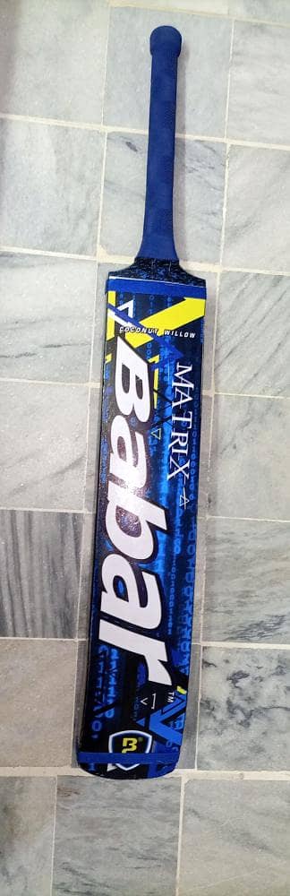 Coconut wood tape ball bat