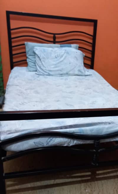 Rod Iron single bed without mattress