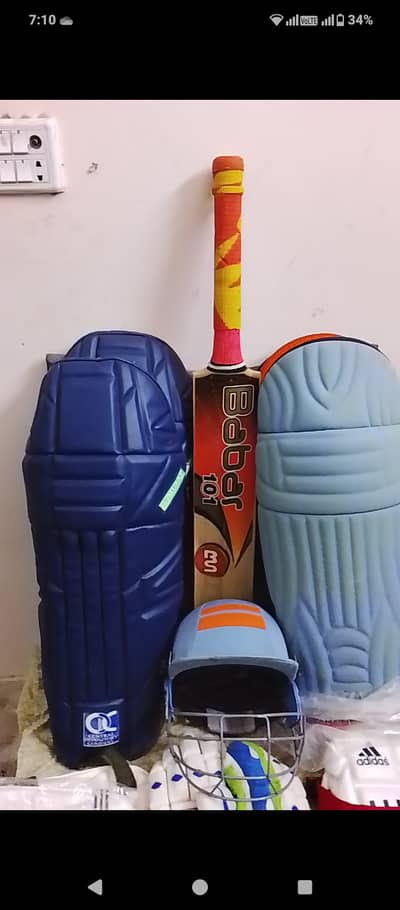 2 pairs of Pads/Gloves/Tighs/Elbows/Guards of ZA sports,1 Helmet/Bat