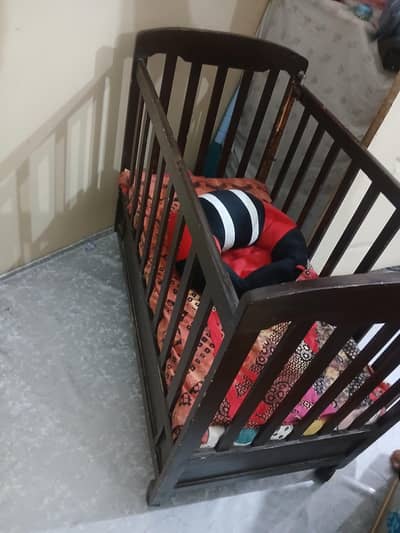 wooden baby cot