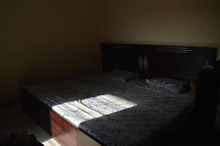 Wooden 2 single bed set with wardrobe and table