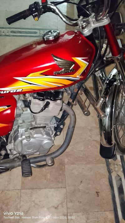 Honda 125  2021 in lush condition  red  colour