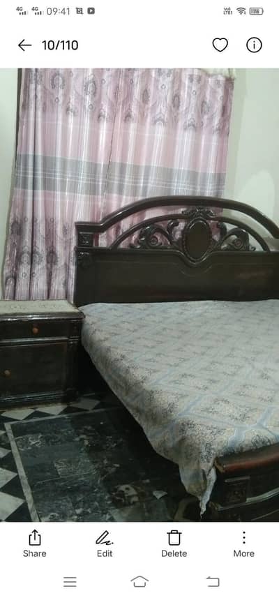 wooden bed and 2 side tables for