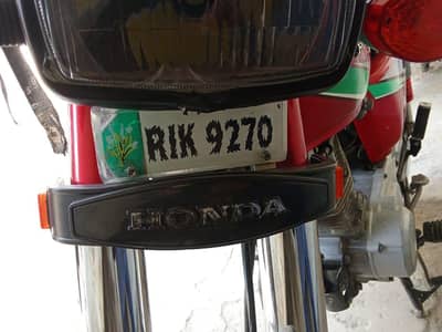Honda 125  2014 model  red color  Rawalpindi reg