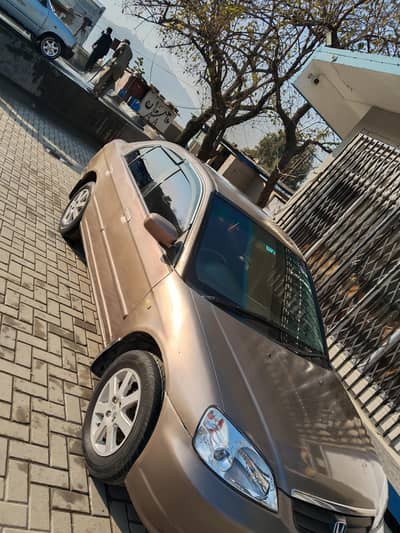 Honda Civic 2003 model exi Apne color mein hai