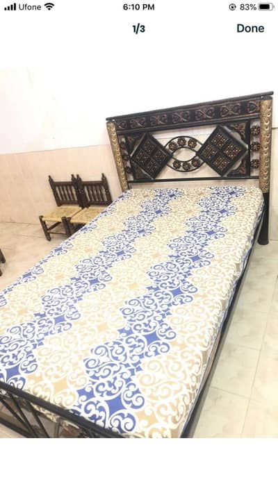 Iron bed and with matress.