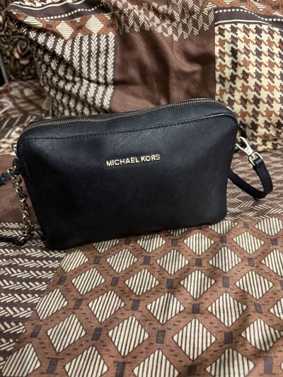 Michael Kors original crossbody bag with coded selling price 6,500