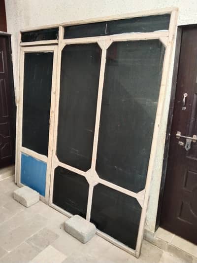 Wood and black glass door