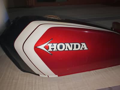 cg 125 original Tanki side cover bhatti paint hua ha