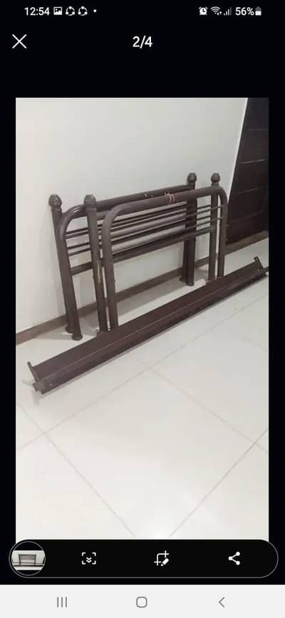 2  singles     wrought iron     beds
