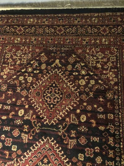 Black and maroon rug