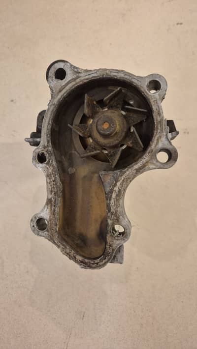 Mitsubishi Lancer water body / pump, Shields, bracket