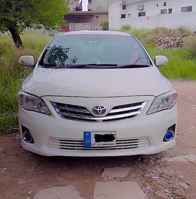 Corolla XLI white color 2009