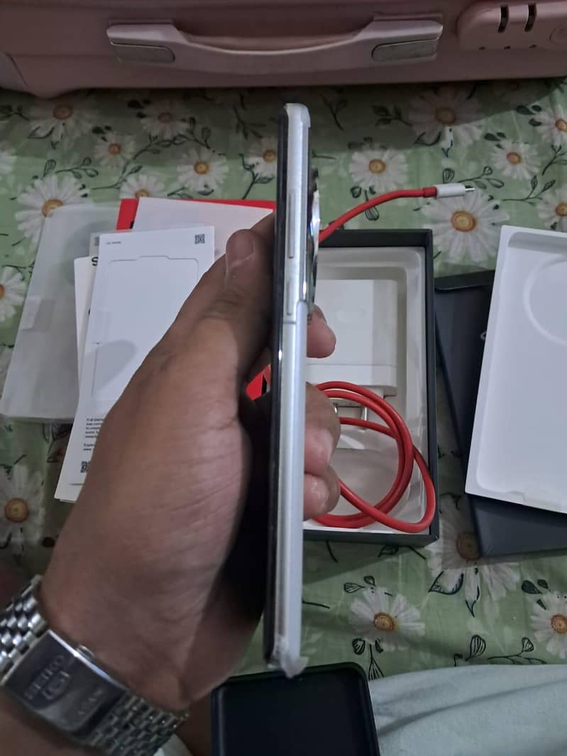 white OnePlus 12 6