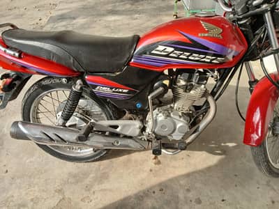honda deluxe total geniune