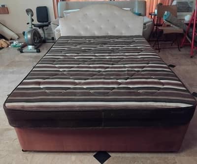 With mattress and head board
