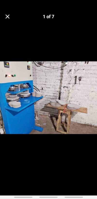 Disposable paper plates making machine