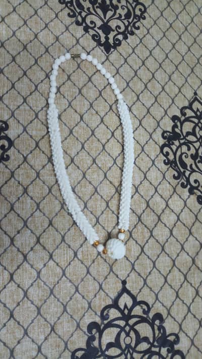 Its import from india necklace made of sea shells