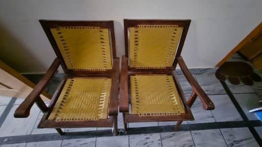 Wood and plastic chairs mix with table
