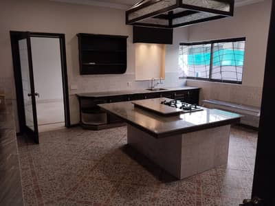 1 kanal beautiful house Facing park available for Rent in phase 4 DHA Lahore