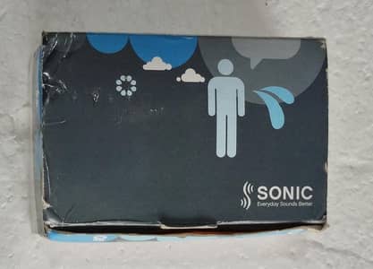 sonic cheer CR40 hearing aids with extra batteries .
