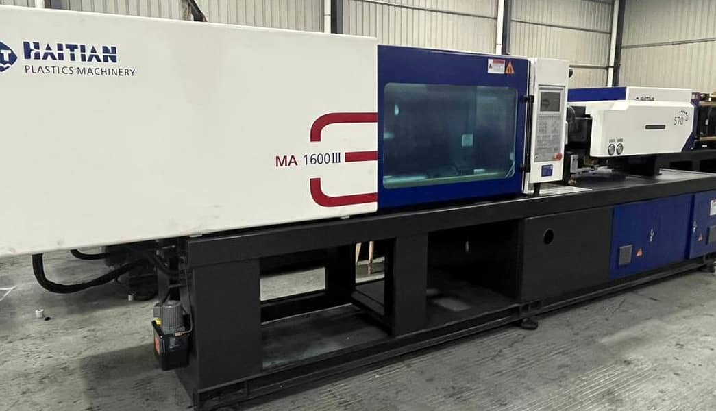 injection moulding machine 12