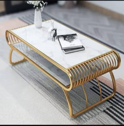 centre tables , coffee tables , nesting tables and consoles