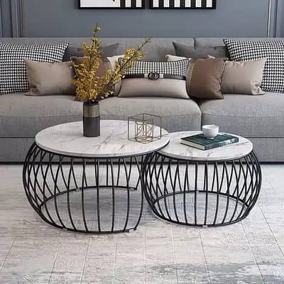 centre tables , coffee tables , nesting tables and consoles