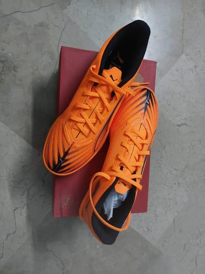 Puma football shoes/grippers brand new with box.