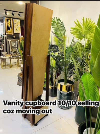 Vanity closet with large mirror