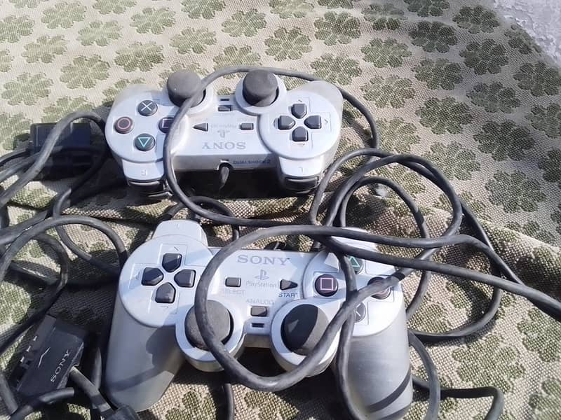 Play station 2 controllers 1