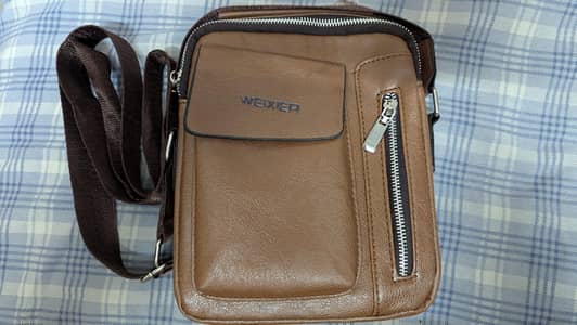 Men cross body and Army style and leather bags in dirt cheap price
