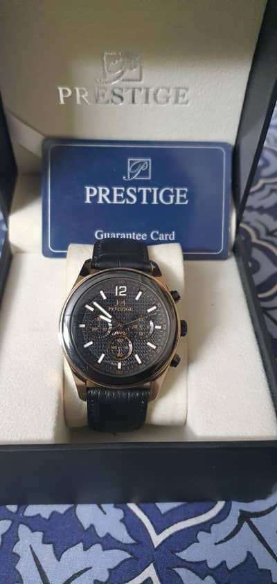 prestige leather strap watch.