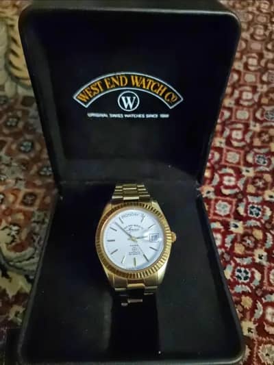 west end watch golden watch.