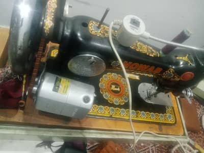 Sewing machine with motor