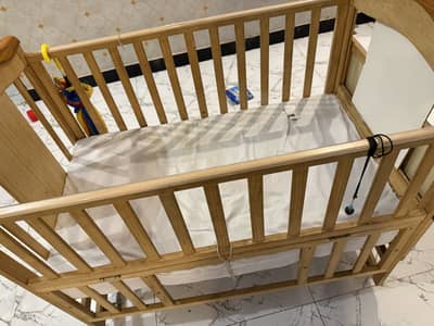 Baby cot with mattress